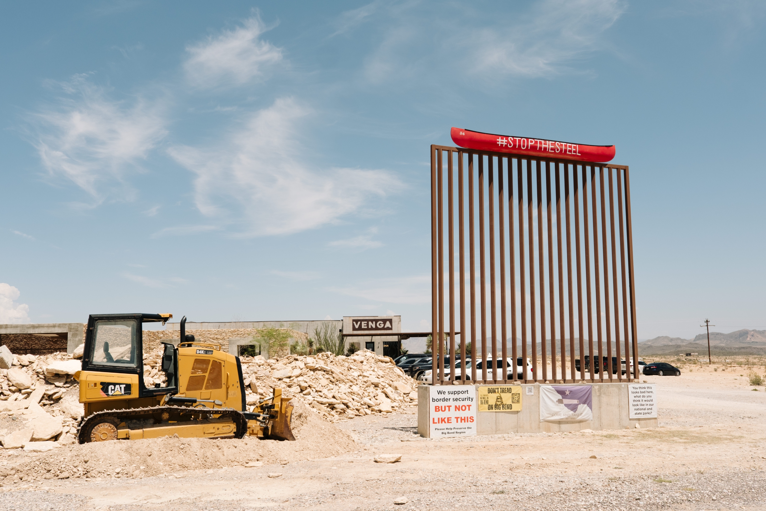 A mock border wall stands in front of Venga Coffee in Terlingua Wednesday, Aug. 12, 2026.
