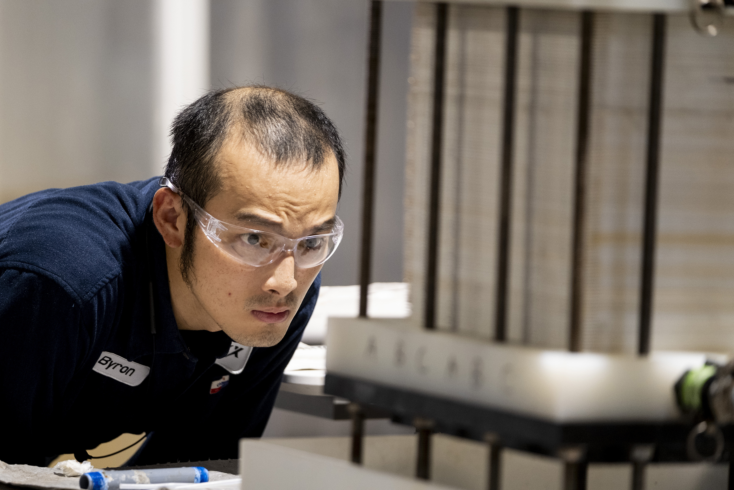 EnergyX Electrodialysis Engineer Byron Tseng watches over the membrane stack during the bipolar electrodialysis process of the direct lithium extract process.
