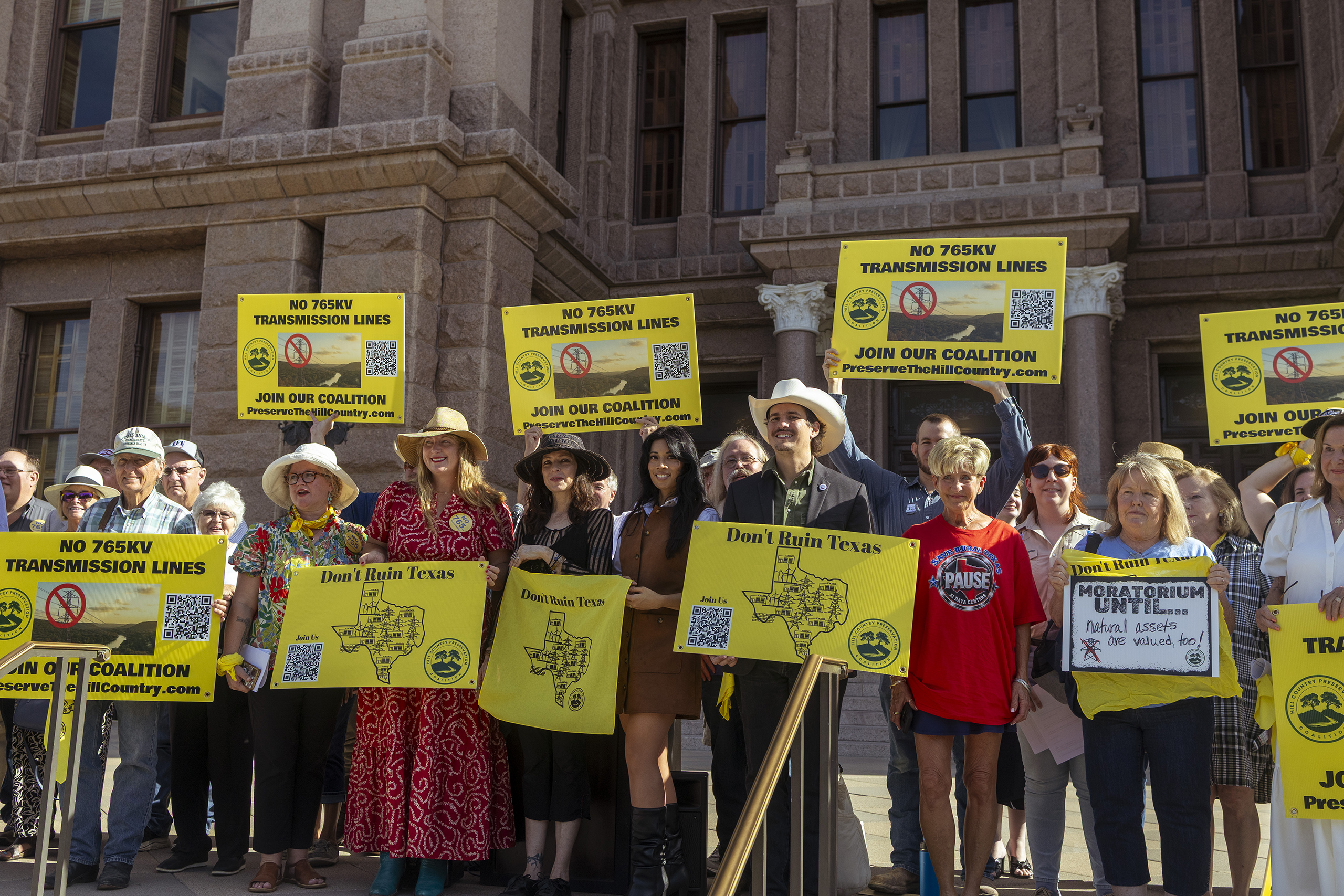Texans rally on the Capitol steps before a House State Affairs committee hearing on data centers and 765-kV transmission lines on Wednesday, Aug. 19th, 2026.