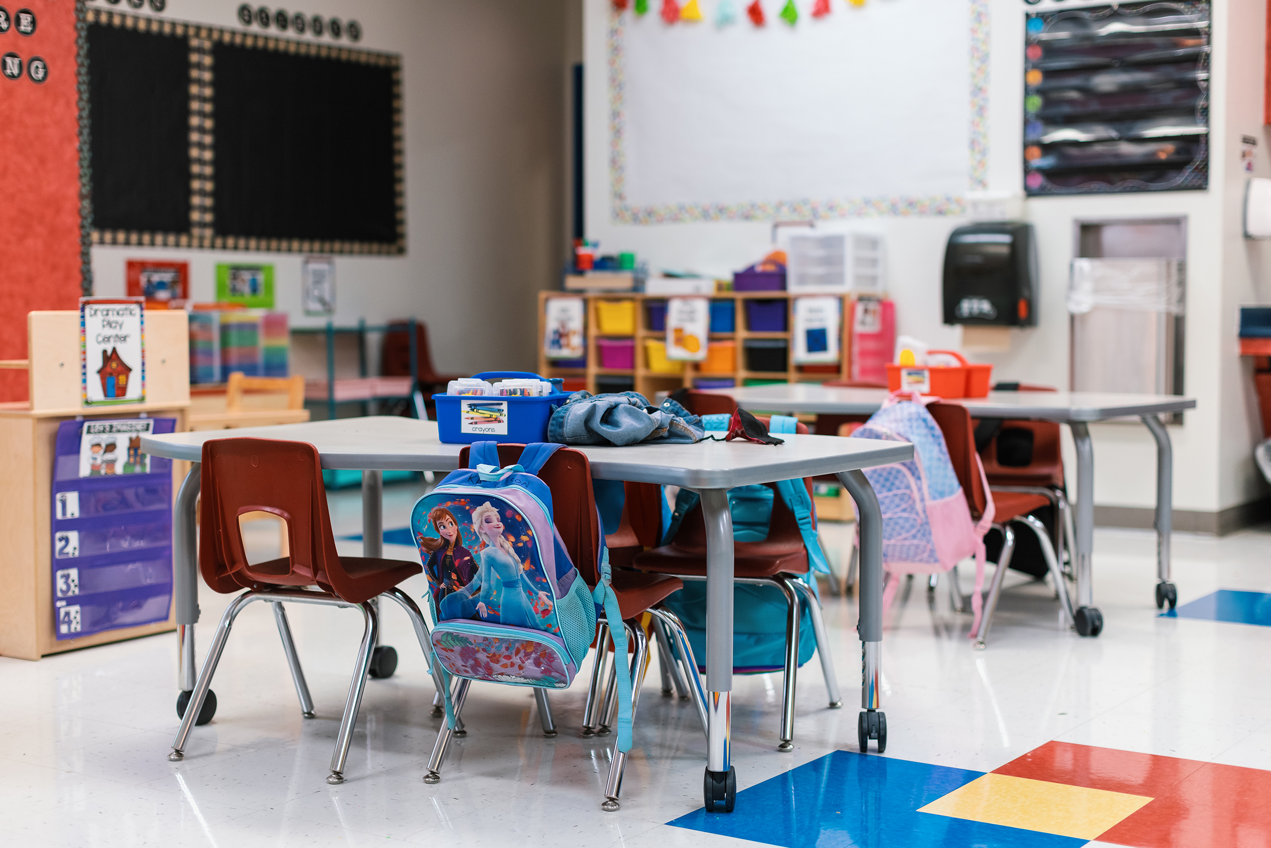 Students backpacks hang off the back of their chairs in an empty classroom at Blanco Vista Elementary School in San Marcos on Aug. 23, 2021.