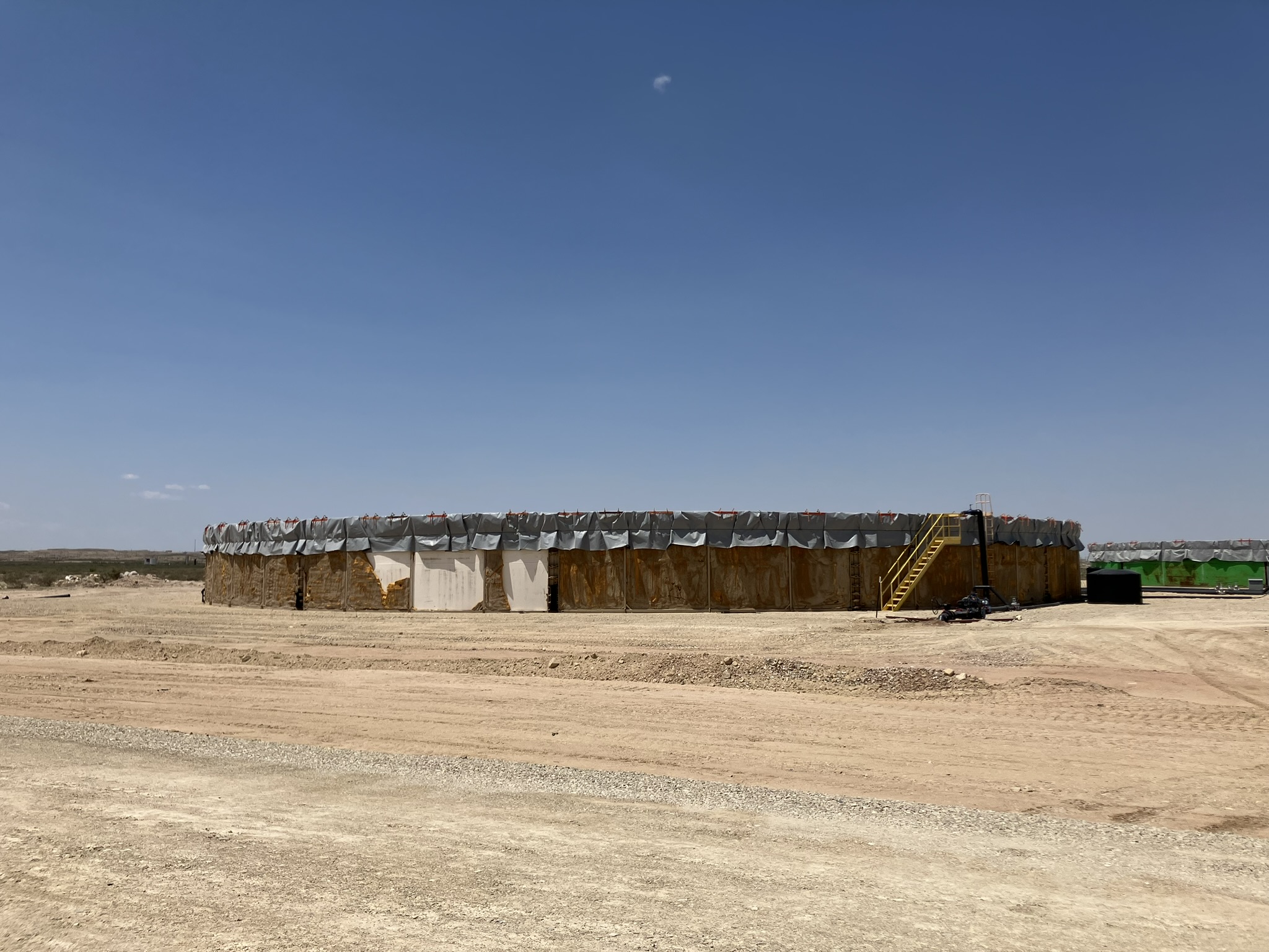Tanks at the treatment plant store produced water prior to treating it.